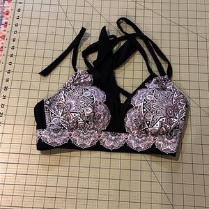 New without tag black halter bikini. TOP ONLY